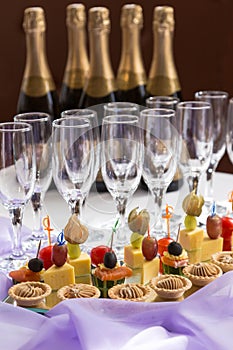 Catering serving buffet with canape and champagne