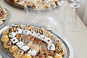 Catering sweets, close up of various kinds of cakes on event or wedding reception