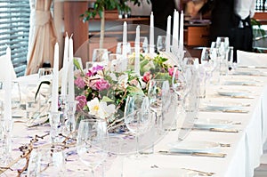 Catering table set with flowers