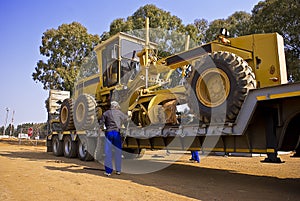 Caterpillar 140H - Chained Down