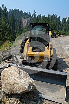 Caterpillar 259D3 Compact Track Loader by the side of a road in Idaho, USA - July 30, 2021