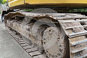 Caterpillar drive of a large excavator, visible up close.