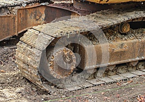 Caterpillar of the excavator. Working outdoor Construction