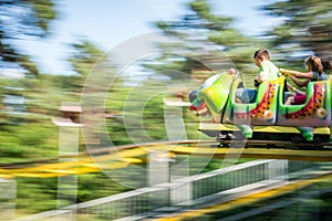 Caterpillar rollercoaster in funpark