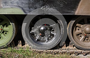 Caterpillar rollers of tank photo