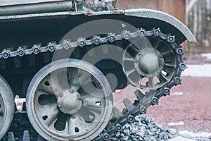 Caterpillars of the tank, side view. Military tank, closeup