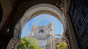 Cathedal of Sevilla from Puerta del Pardon Gate in Spain