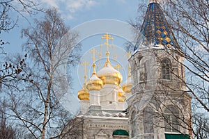 Cathedral ancient Russian architecture. A big white church with golden domes