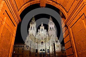 Cathedral, baroque facade and towers from Praza do Obradoiro at night. Santiago de Compostela, Galicia, Spain. photo