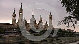 Cathedral Basilica Our Lady of Pillar and Ebro river at sunset of Zaragoza