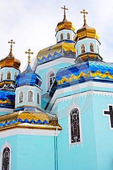 Cathedral with blue and gold domes. photo