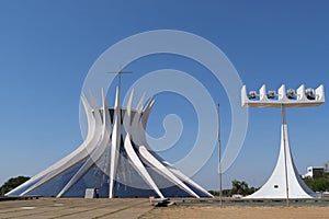 The Cathedral of Brasilia, a crown-like structure, with chandelier-shaped clocks, designed by the Brazilian architect Oscar