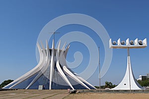 The Cathedral of Brasilia, a crown-like structure, with chandelier-shaped clocks, designed by the Brazilian architect Oscar photo