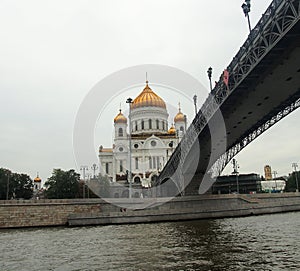 Cathedral of Christ the Saviour and Patriarchal bridge. Walk on the river Moscow. Moscow, Russia