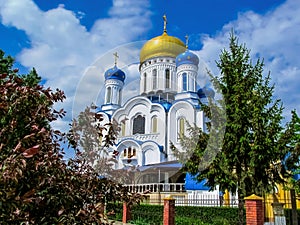 Cathedral of Christ the Saviour in Uzhhorod Ukraine, close-up. Beautiful modern orthodox temple with yellow-blue domes on a