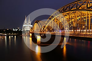 Cathedral of Cologne and iron bridge over Rhine river