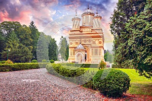 Beautiful Curtea de Arges Monastery at sunset photo