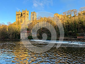 Cathedral of Durham UK reflecting in the River Wear at sunset