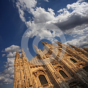 Cathedral Facade under a Cloudy Sky photo