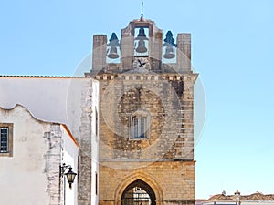 Cathedral of Faro or Se catedral de Faro with a bell tower at the Algarve coast of Portugal