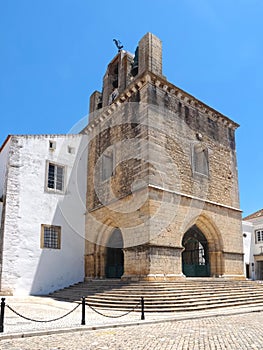 Cathedral of Faro or Se catedral de Faro with a bell tower at the Algarve coast of Portugal