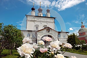 Cathedral and flowers in front of him