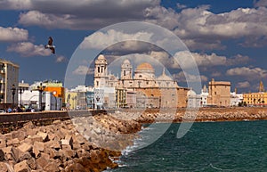 Cathedral of the Holy Cross on the waterfront of Cadiz on a sunny day.