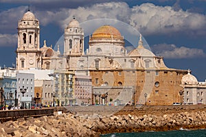 Cathedral of the Holy Cross on the waterfront of Cadiz on a sunny day.