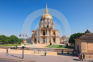 The Cathedral of Invalids in sunny spring day. Famous touristic places and travel destinations in Paris.