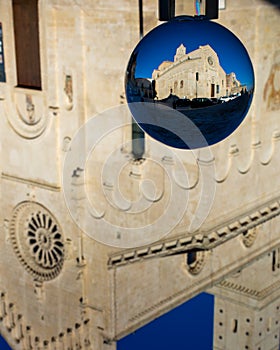 The Cathedral of Matera in a Cristal Sphere on Blue Sky Background