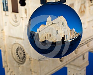 The Cathedral of Matera in a Cristal Sphere on Blue Sky Background