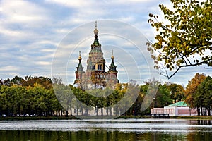 Cathedral of Peter and Paul in Petergof against a blue cloudy sky