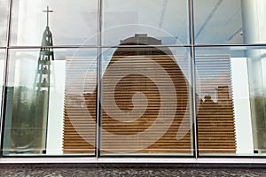 Cathedral reflections in modern building