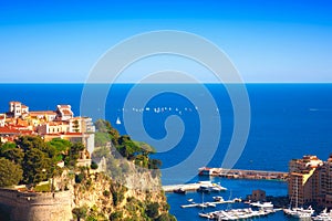 The cathedral on the Rocher, the port of Fontvieille photo