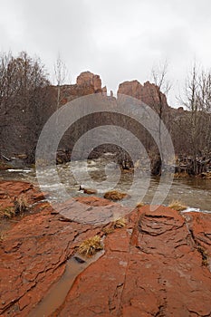 Cathedral Rock in Red Rock State Park outside of Sedona, Arizona on cloudy snowy winter day.