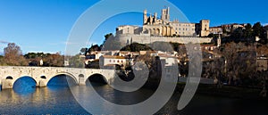 Cathedral of Saint Nazaire and Old Bridge across Orb river, Beziers