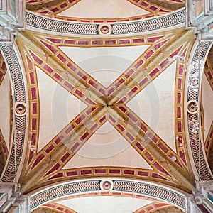 The cathedral of Santa Maria Assunta is the main place of worship in Pienza. Detail of the decorated ceiling