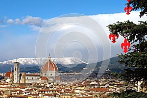 Cathedral Santa Maria del Fiore Duomo and giottos bell tower campanile, in winter with snow Florence, Tuscany
