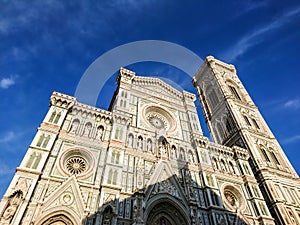Cathedral of Santa Maria del Fiore facade blue sky