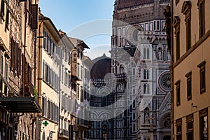 The cathedral Santa Maria del Fiore in Florence, seen from a street further away