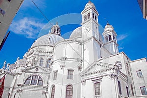 Cathedral of Santa Maria della salute in Venice, close-up against the blue sky