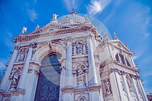 Cathedral of Santa Maria della salute in Venice, close-up against the blue sky