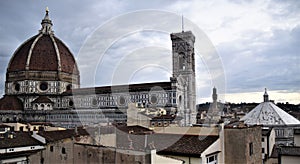 Cathedral of Santa Maria in Fiore under a gray sky, view from the Ximeniana tower, in Florence.