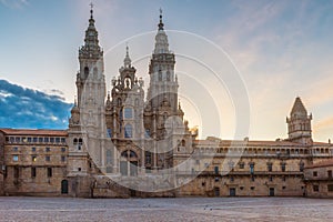 Cathedral of Santiago de Compostela at sunrise from main square Praza do Obradoiro, Galicia, Spain. Facade of famous photo