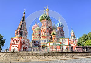 Cathedral of Vasily the Blessed Saint Basil`s Cathedral and Spasskaya tower of Moscow Kremlin on Red Square, Moscow, Russia