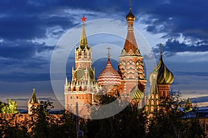 Cathedral of Vasily the Blessed Saint Basil`s Cathedral and Spasskaya Tower of Moscow Kremlin on Red Square at sunset, Moscow,