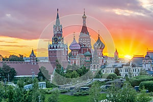 Cathedral of Vasily the Blessed Saint Basil`s Cathedral and Spasskaya Tower of Moscow Kremlin on Red Square at sunset, Russia