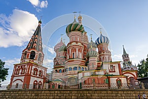 Cathedral of Vasily the Blessed Saint Basil`s Cathedral and Spasskaya tower on Red Square at sunset, Moscow, Russia