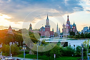 Cathedral of Vasily the Blessed Saint Basil`s Cathedral and towers of Moscow Kremlin on Red Square at sunset, Russia