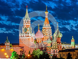 Cathedral of Vasily the Blessed and Spasskaya Tower of Moscow Kremlin on Red Square at sunset, Moscow,